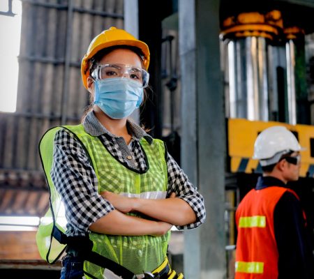 Factory,Woman,Worker,Or,Technician,With,Hygienic,Mask,Stand,With